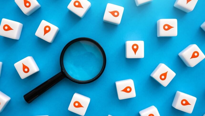 how to do local seo - magnifying glass with red location pins